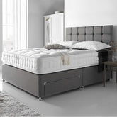 Classic divan bed with plush velvet upholstered base and headboard