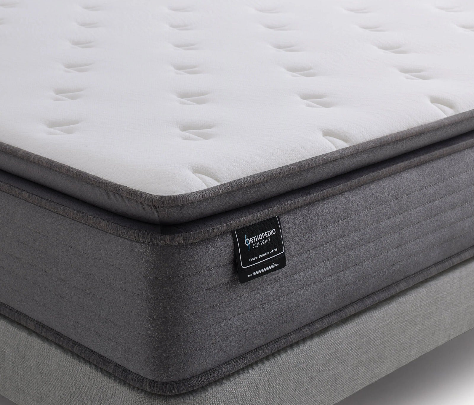 Luxury pillowtop mattress construction showing knitted fabric cover, wool comfort layer, foam support layers and Pro Pocket spring system with reinforced edge support